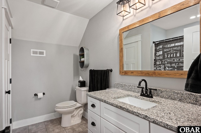 bathroom with toilet, lofted ceiling, visible vents, and tile patterned floors