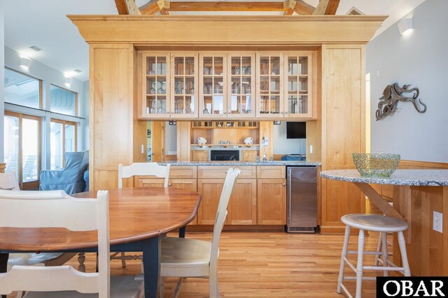 dining room featuring light wood finished floors