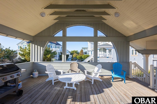 wooden terrace featuring grilling area