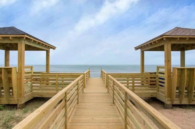 view of home's community featuring a water view and a gazebo