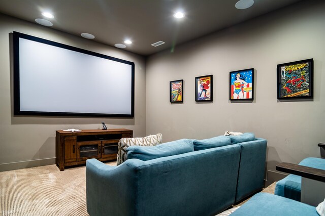 home theater with light carpet, visible vents, and recessed lighting