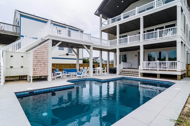 view of pool with a fenced in pool and a patio