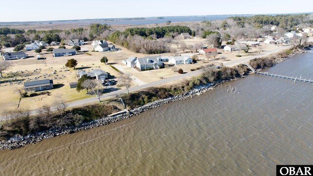 aerial view featuring a water view and a residential view