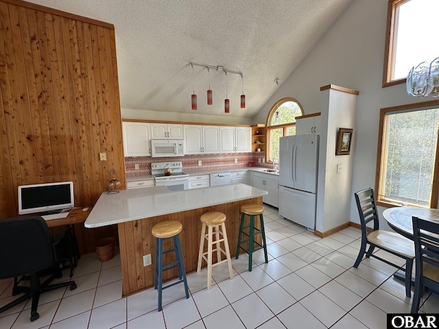kitchen featuring open shelves, tasteful backsplash, white appliances, a textured ceiling, and white cabinets