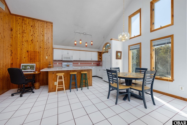 kitchen with decorative backsplash, white appliances, open shelves, and a textured ceiling