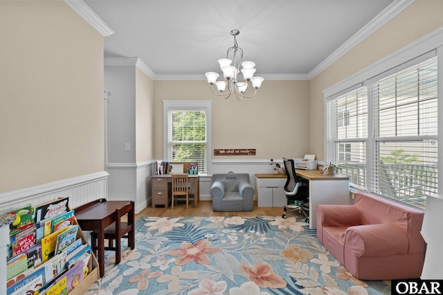 office space with crown molding, a chandelier, wood finished floors, and wainscoting