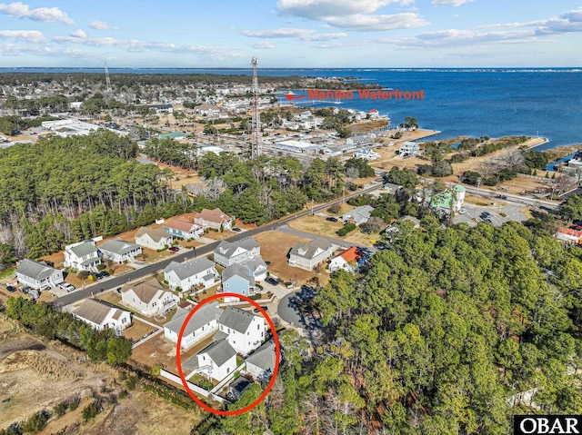 bird's eye view featuring a residential view and a water view