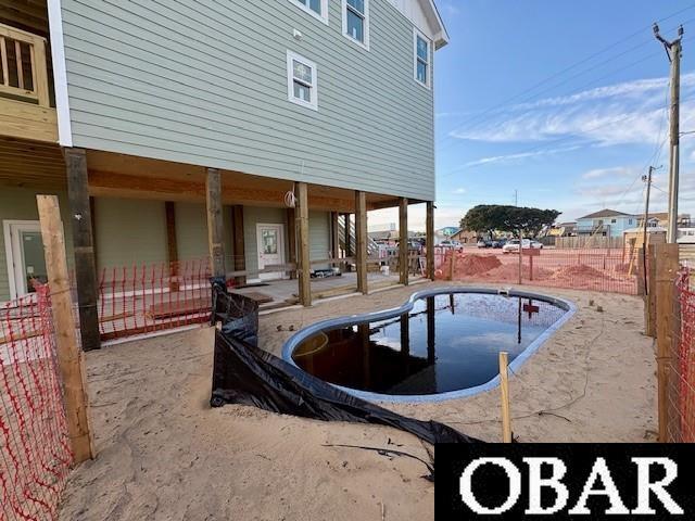 view of pool featuring a fenced backyard, a fenced in pool, and a patio