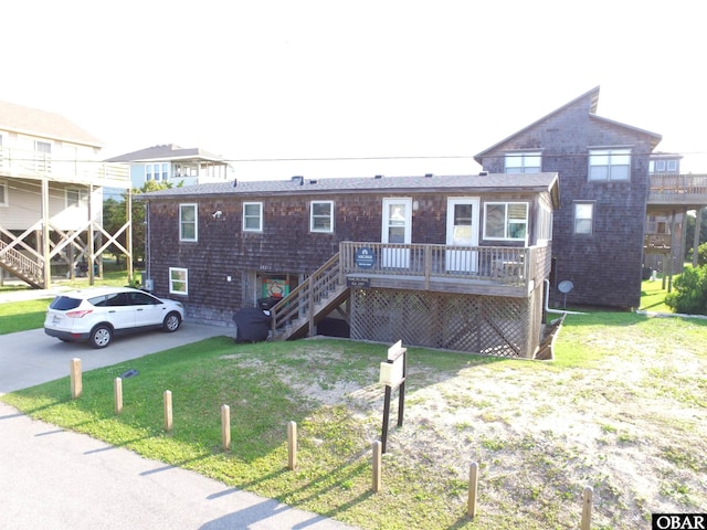 58211 Gray Eagle St Lot 6, Hatteras, NC 27943 - view of front of property featuring stairway, a front yard, and a deck
