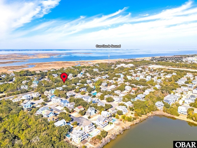 bird's eye view featuring a residential view and a water view