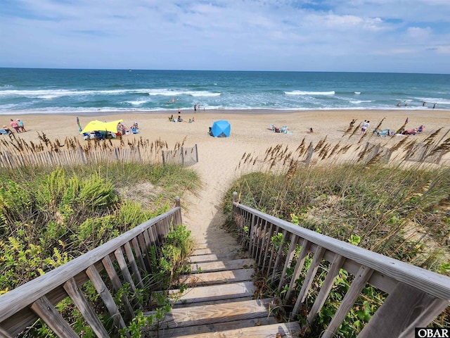 view of water feature with a beach view