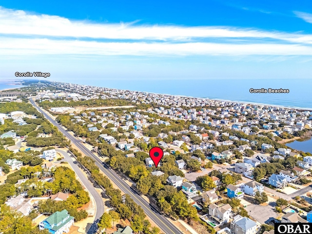 aerial view with a residential view and a water view