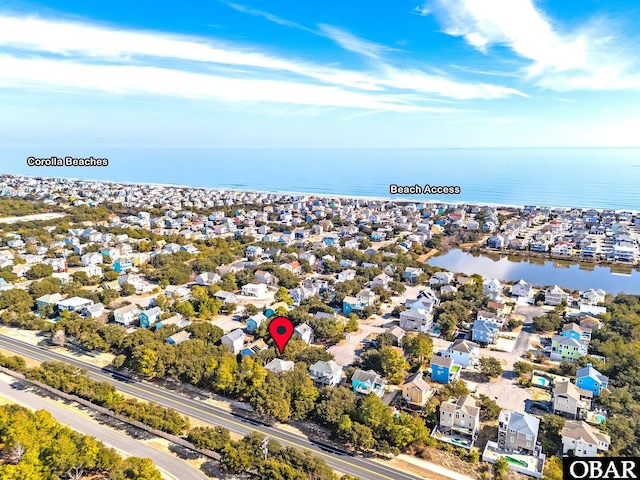 aerial view featuring a water view and a residential view