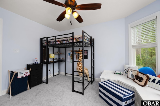 bedroom featuring carpet floors, baseboards, and ceiling fan