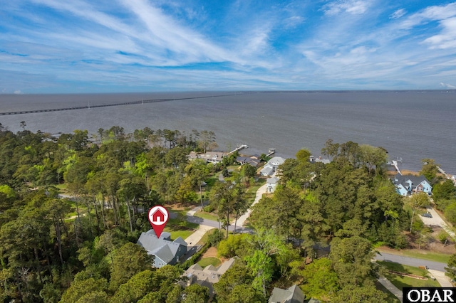 bird's eye view with a residential view and a water view