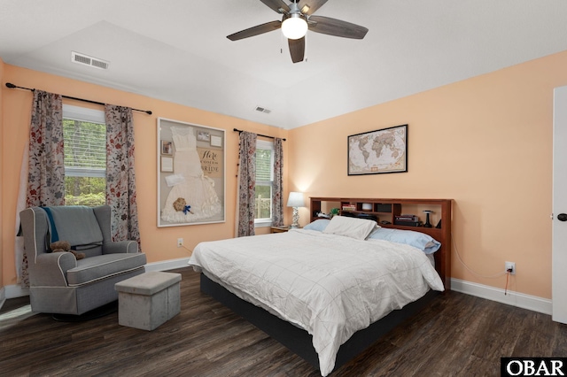 bedroom with visible vents, baseboards, ceiling fan, and wood finished floors