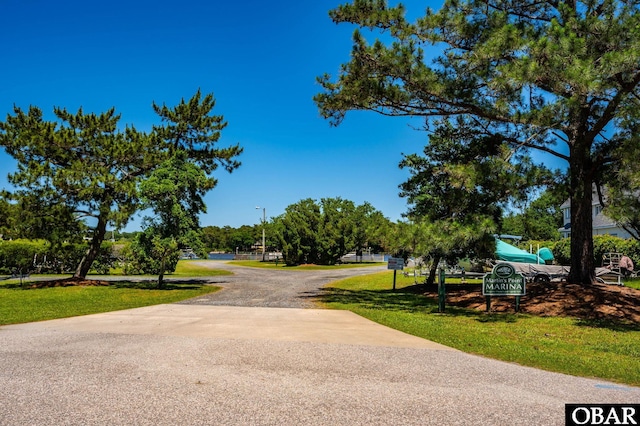 view of road with driveway