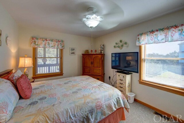 183 Lighthouse Rd Lot 3, Ocracoke, NC 27960 - bedroom with carpet floors, baseboards, and a ceiling fan