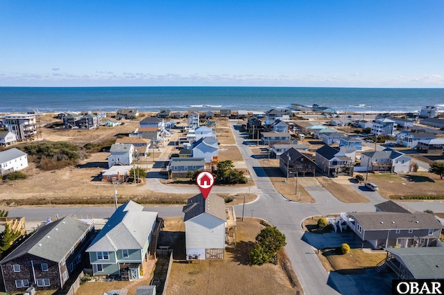 aerial view with a residential view and a water view