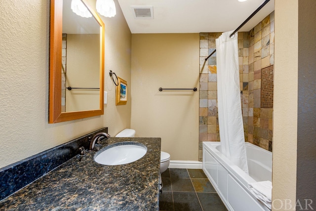 bathroom with shower / tub combo, baseboards, visible vents, toilet, and vanity