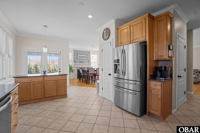 kitchen featuring appliances with stainless steel finishes, light tile patterned flooring, ornamental molding, and tasteful backsplash