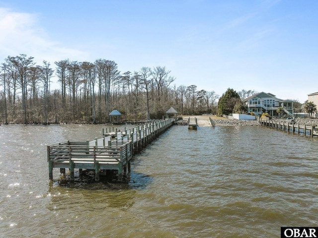 view of dock with a water view