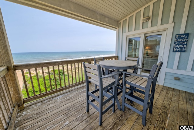 24252 Resort Rodanthe Dr Unit 1C, Rodanthe, NC 27968 - deck featuring view of water and beach and outdoor dining space