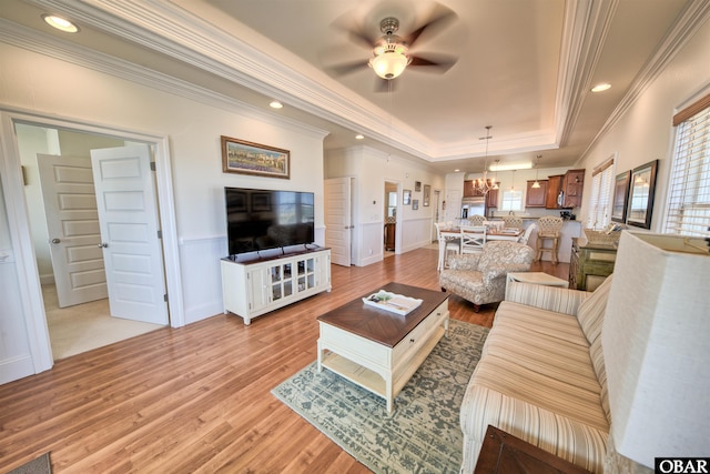 24252 Resort Rodanthe Dr Unit 1C, Rodanthe, NC 27968 - living area with a raised ceiling, light wood finished floors, ornamental molding, a ceiling fan, and recessed lighting
