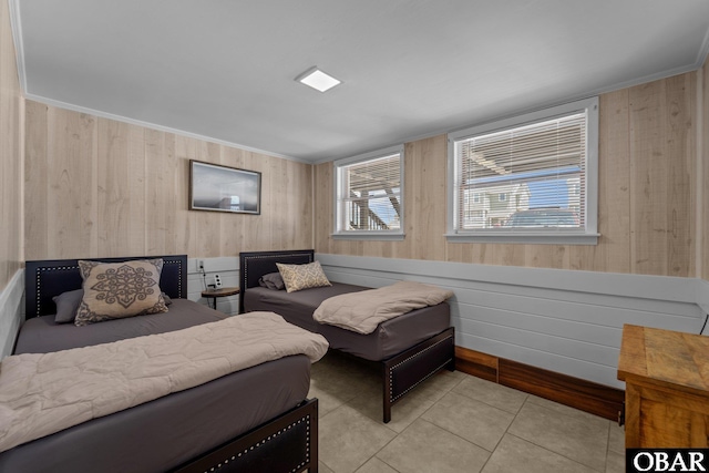 402 N Memorial Blvd Lot 3, Kill Devil Hills, NC 27948 - tiled bedroom featuring wood walls