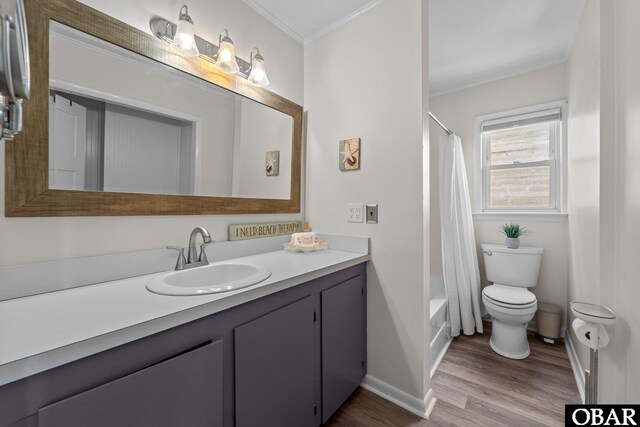 402 N Memorial Blvd Lot 3, Kill Devil Hills, NC 27948 - full bath featuring ornamental molding, wood finished floors, toilet, vanity, and baseboards