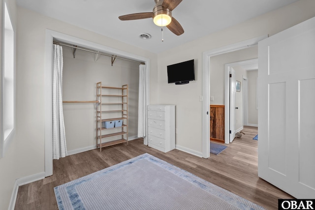 402 N Memorial Blvd Lot 3, Kill Devil Hills, NC 27948 - bedroom featuring wood finished floors, a closet, baseboards, and ceiling fan