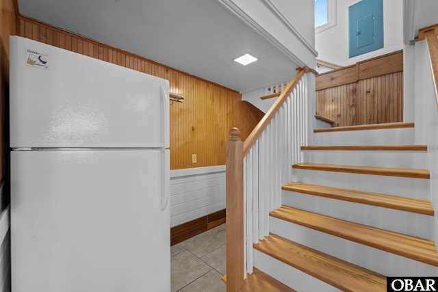402 N Memorial Blvd Lot 3, Kill Devil Hills, NC 27948 - stairway with wooden walls and tile patterned flooring