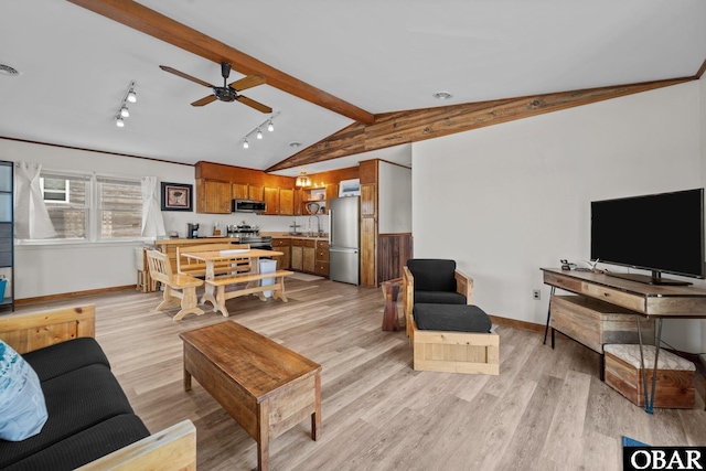 402 N Memorial Blvd Lot 3, Kill Devil Hills, NC 27948 - living area featuring light wood-type flooring, ceiling fan, baseboards, and rail lighting