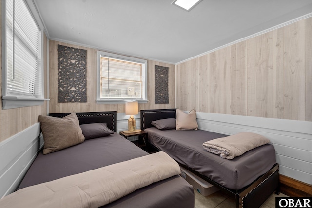 402 N Memorial Blvd Lot 3, Kill Devil Hills, NC 27948 - bedroom featuring wood walls and crown molding
