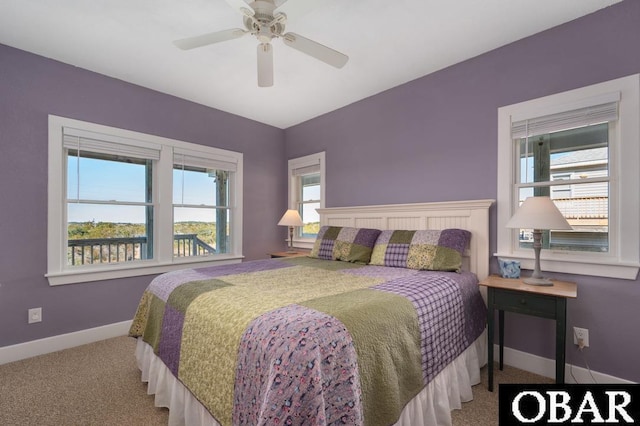 bedroom with baseboards, carpet, and a ceiling fan