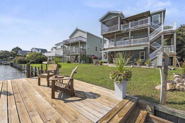 exterior space featuring a water view and a yard