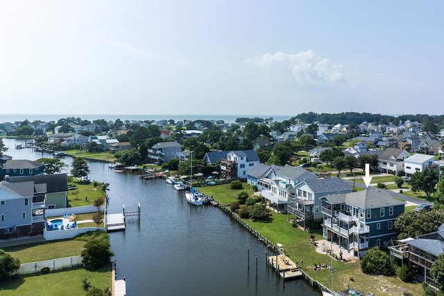 aerial view with a water view and a residential view