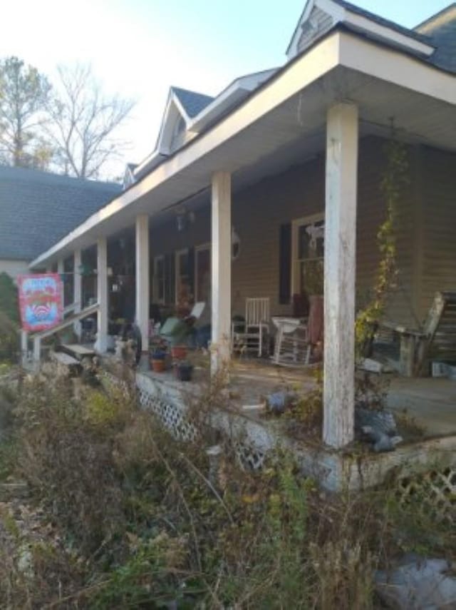 view of home's exterior featuring a porch