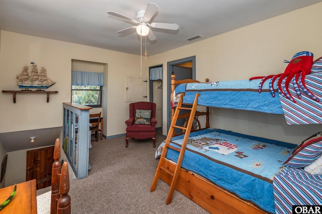 bedroom with a ceiling fan, carpet flooring, and visible vents
