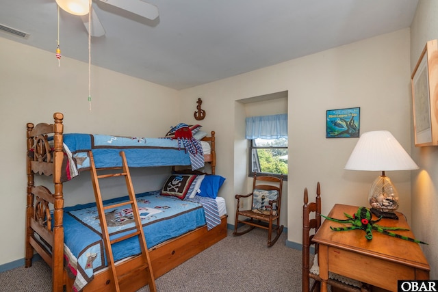 bedroom with carpet, visible vents, a ceiling fan, and baseboards