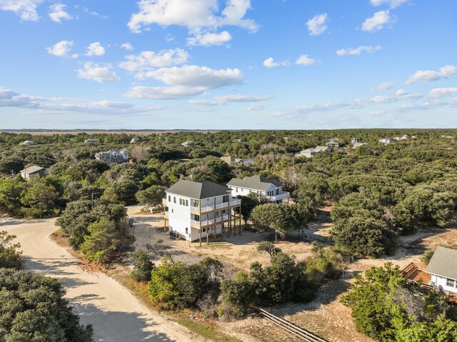 bird's eye view featuring a view of trees