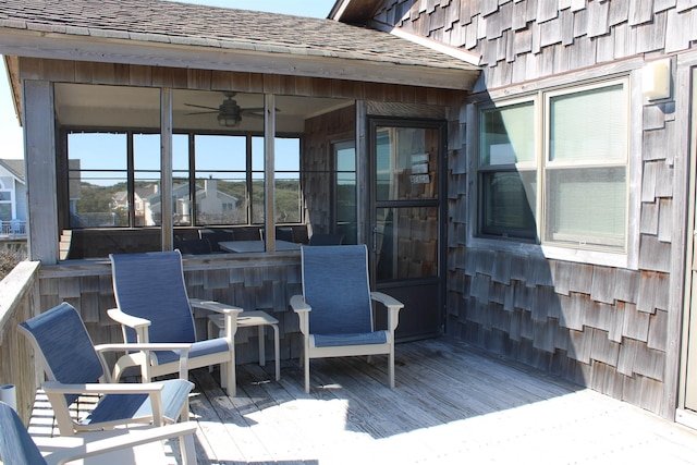 wooden deck with ceiling fan