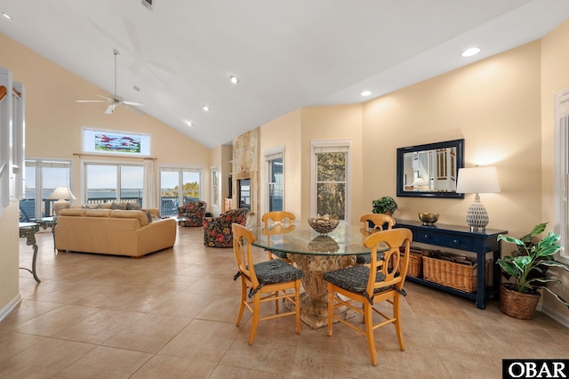 dining area featuring high vaulted ceiling, recessed lighting, ceiling fan, and light tile patterned floors