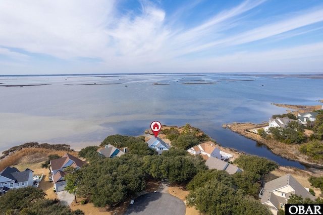 aerial view featuring a residential view and a water view