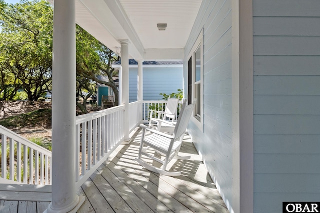 wooden deck with a porch