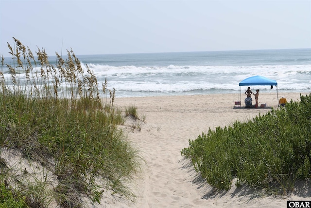 property view of water featuring a view of the beach