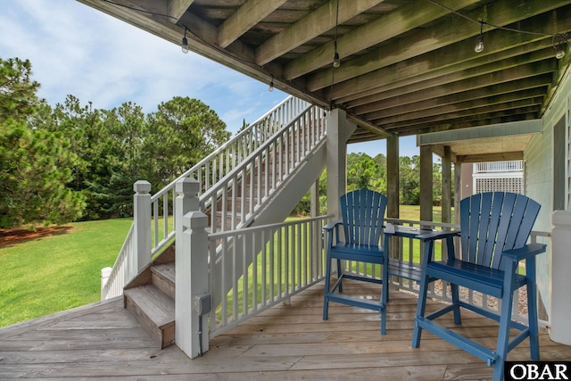 wooden terrace with a yard and stairway