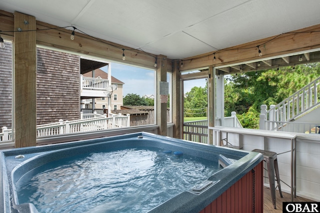 view of pool featuring a hot tub