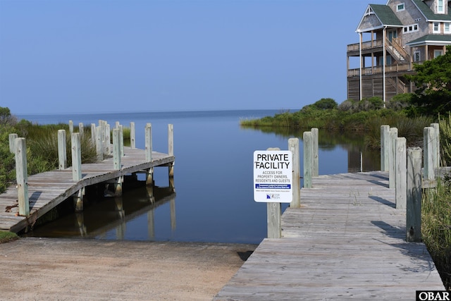 view of dock featuring a water view