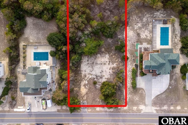 812 Whalehead Dr Lot #, Corolla, NC 27927 - aerial view of property and surrounding area featuring a pool and property parcel outlined